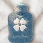 bouillotte en forme de trèfle bleu