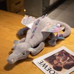 dragon en peluche doux et rose