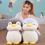jouet pingouin souriant