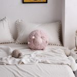 mouton en peluche ronde