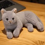 peluche chat tout gris