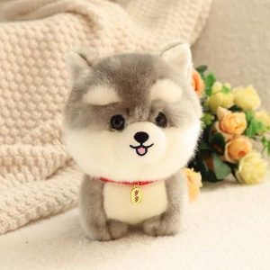 peluche chien blanc et gris