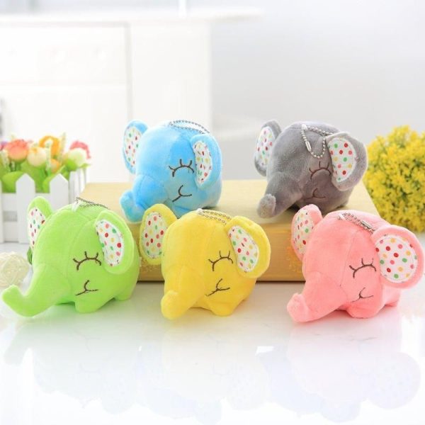 peluche éléphant heureux