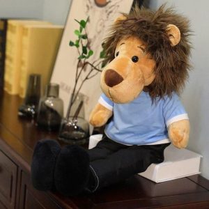 peluche géante lion habillé bleu