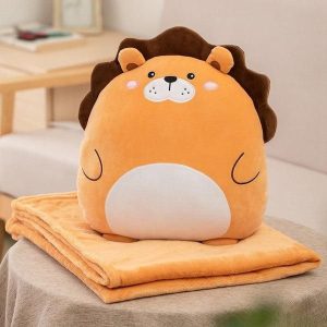 peluche lion avec une couverture