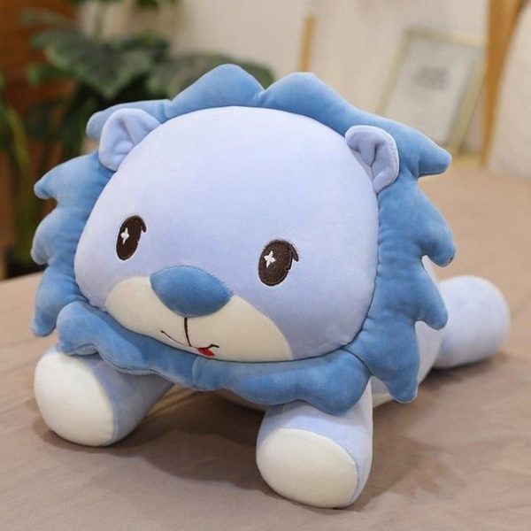 peluche lion couchée