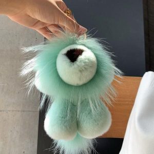 peluche lion vert