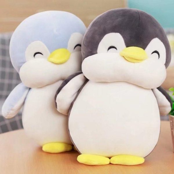 peluche pingouin souriant
