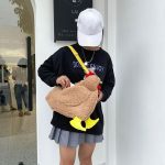 peluche poule avec bandoulière