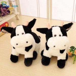 peluche vache noire et blanche
